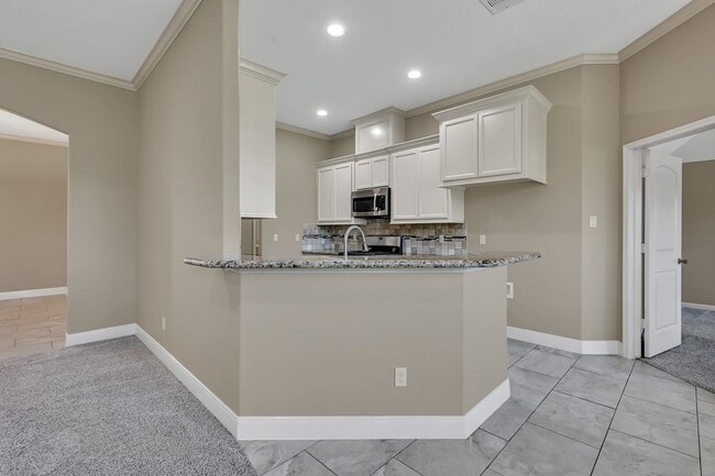 Building Photo - One story, and a 3-car garage!