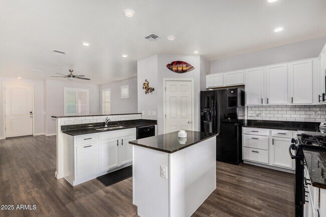 Building Photo - 36909 N Coronado Ln