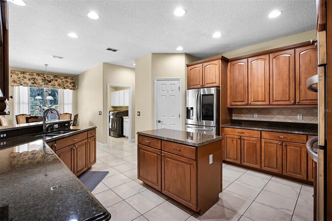 Building Photo - 4905 Legacy Oaks Dr