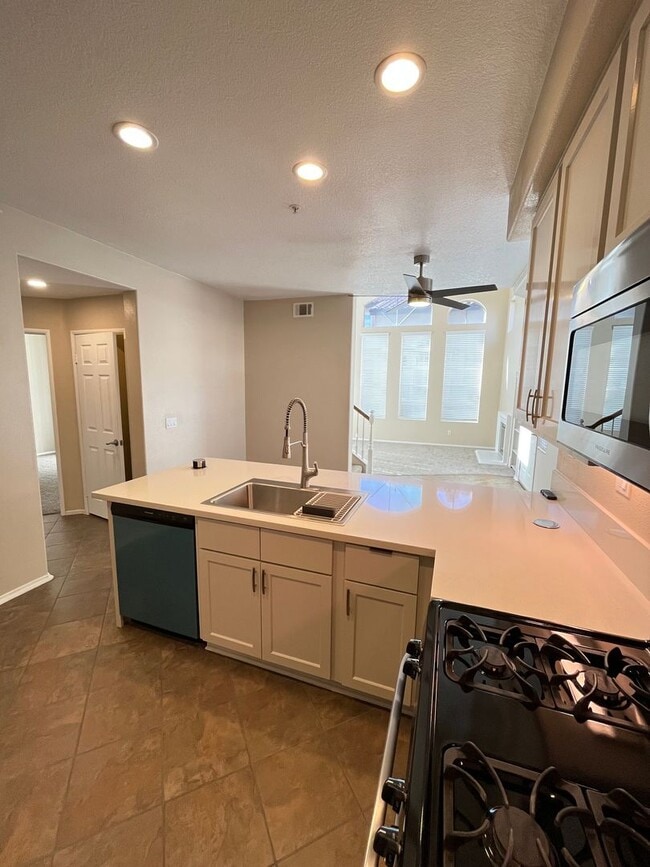 Building Photo - PICTURE PERFECT!  3 BR/3 BA END UNIT CONDO with DIRECT ACCESS 2 CAR GARAGE