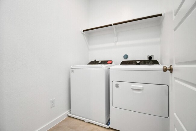 Building Photo - 8408 Rising Stream Dr