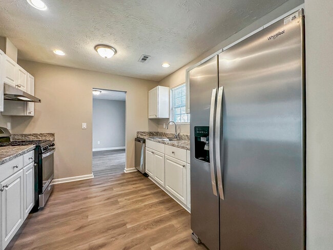 Building Photo - 7065 Merrywood Dr