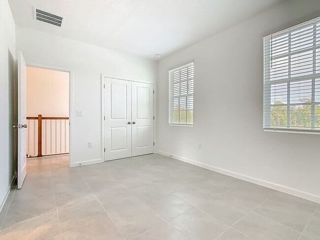 Building Photo - New Luxury Townhome in Celebration with All porcelain tiled floors. Island Village new construction