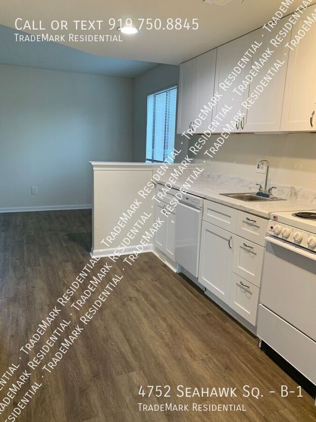 Building Photo - Renovated 1st Floor 1 Bedroom Condo Seahaw...