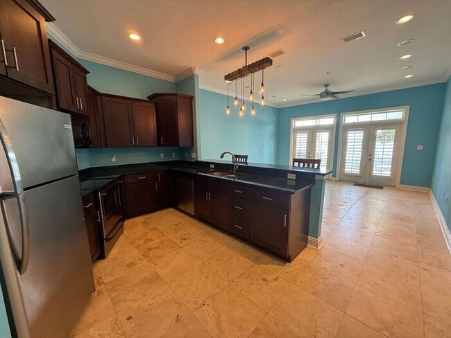 Building Photo - Navarre - Hidden Bay Village - 3 bedroom, 3 bathroom - Waterfront Townhome