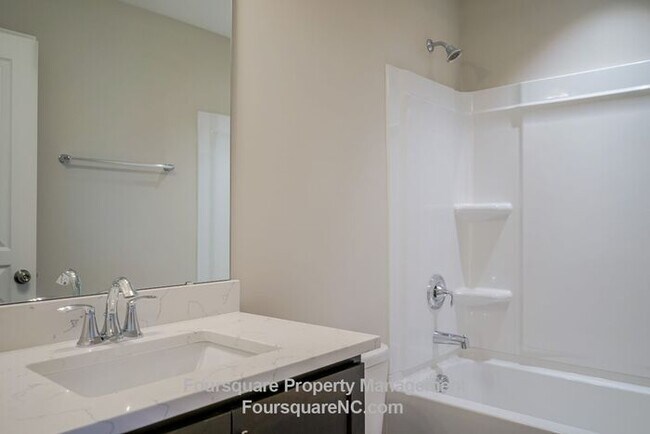 Building Photo - Modern 3-Story Townhome with Entry-Level Bonus Room, Back Deck & Garage , Community Pool in North...
