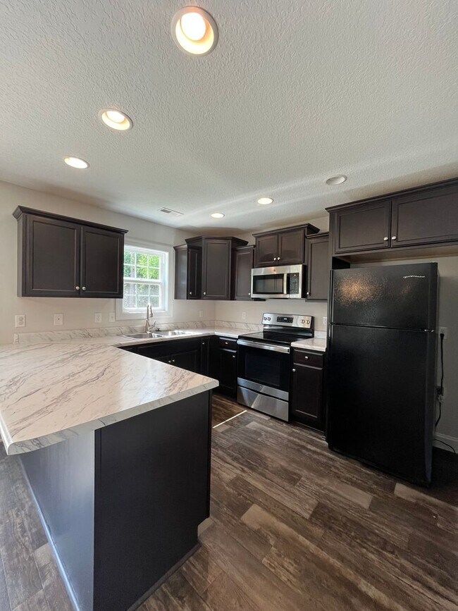 Building Photo - Welcome to Sterling Farms!