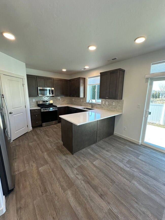 Building Photo - Brand New to Market! Four Bedroom, and Thr...