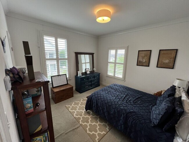 Building Photo - Luxury 4BR Home in Americana | 11 Ft Ceilings, Courtyard Living & Furnished Option at $3,950