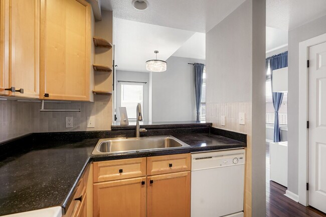 Building Photo - Starter 2 Bedroom with Dedicated Parking Space