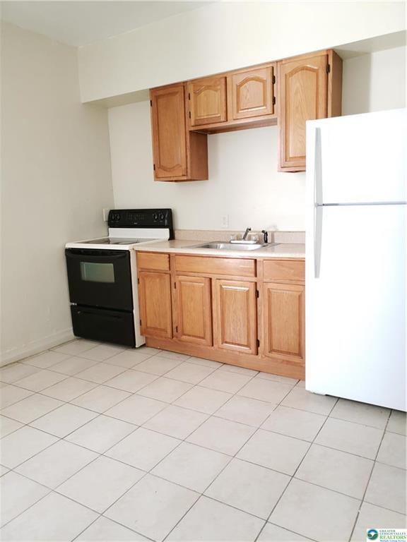 Building Photo - 718 W Chew St