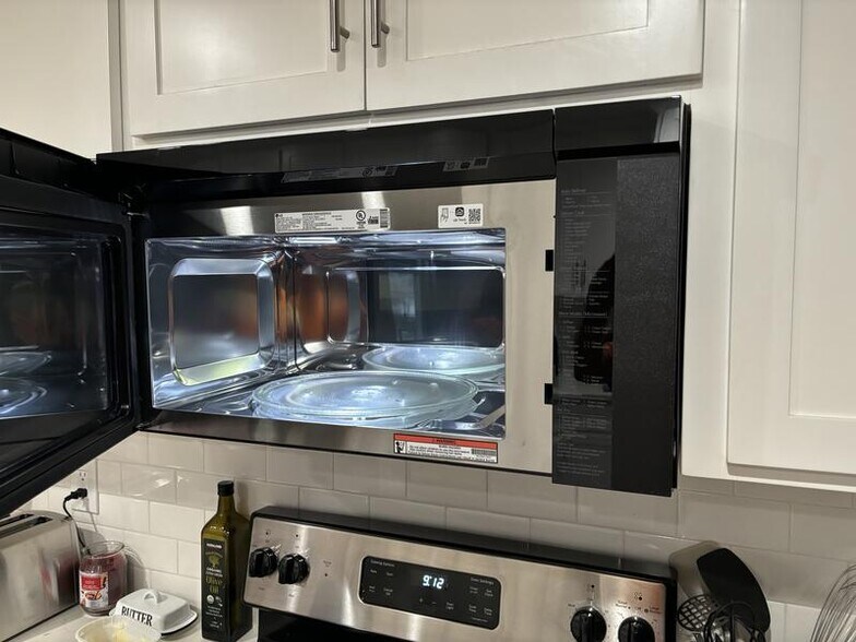 Included: LG microwave + convection oven + air fryer. Roomy enough to bake a pizza! - 24606 University Ave