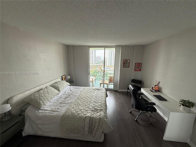 Building Photo - 19390 Collins Ave