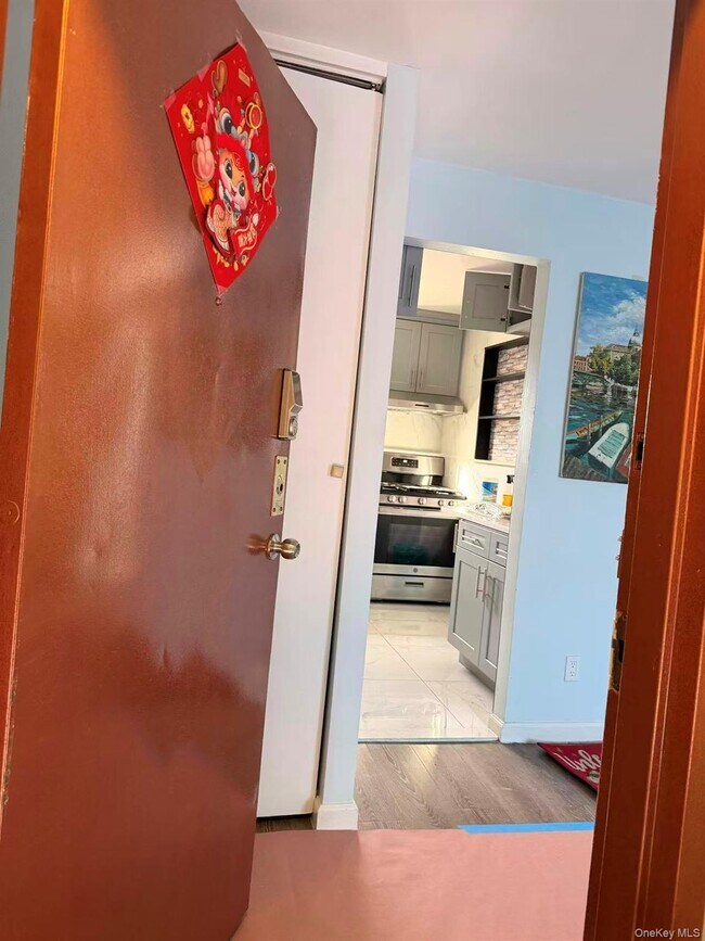 Building Photo - 55-12 Main St