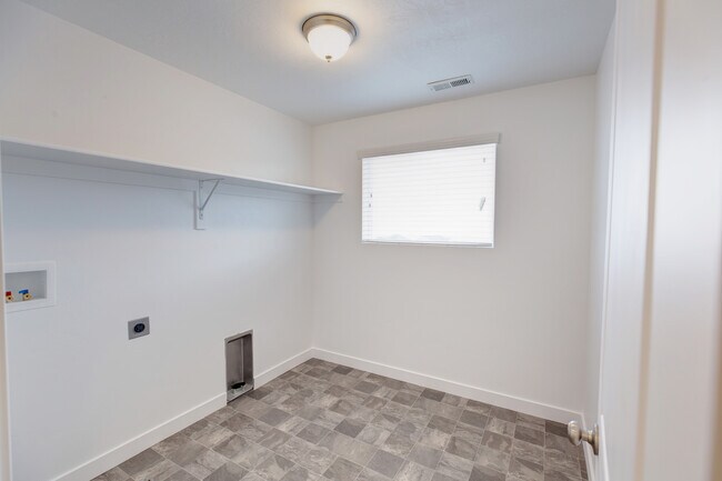 Upstairs laundry room with hook ups - 3011 South Red Pine Drive