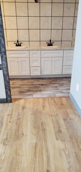 Tile floor and walls in Master Restroom and walking shower - 522 Soechting