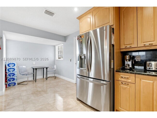 Building Photo - 6049 W 14th Ln