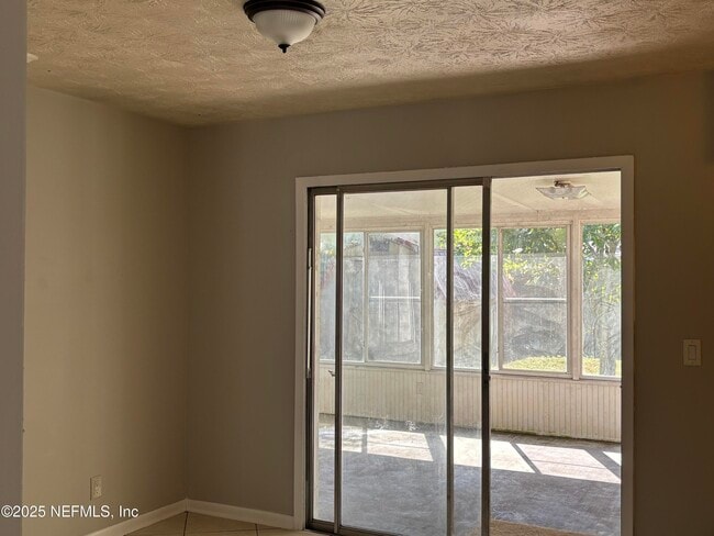 Building Photo - 7430 Jade Dr N