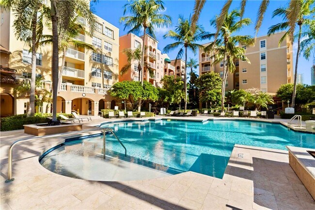 Building Photo - Spacious 1-bed, 1-bath condo is nestled in the gated waterfront community of The Yacht Club at Av...
