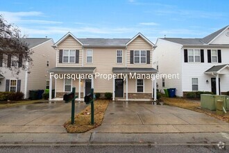 Building Photo - End Unit Townhome| Back Screened Porch |Co...