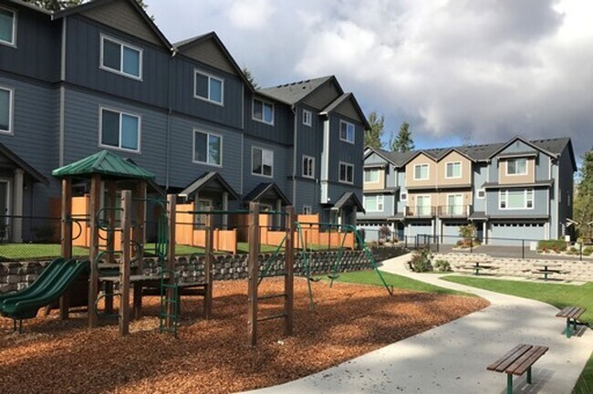 Building Photo - Move in Ready! Spacious 3 bedroom, 2.5 bath Townhome with small fenced backyard, located in sough...
