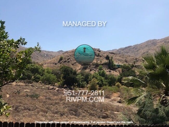 Building Photo - Nestled up against the hills with no one b...