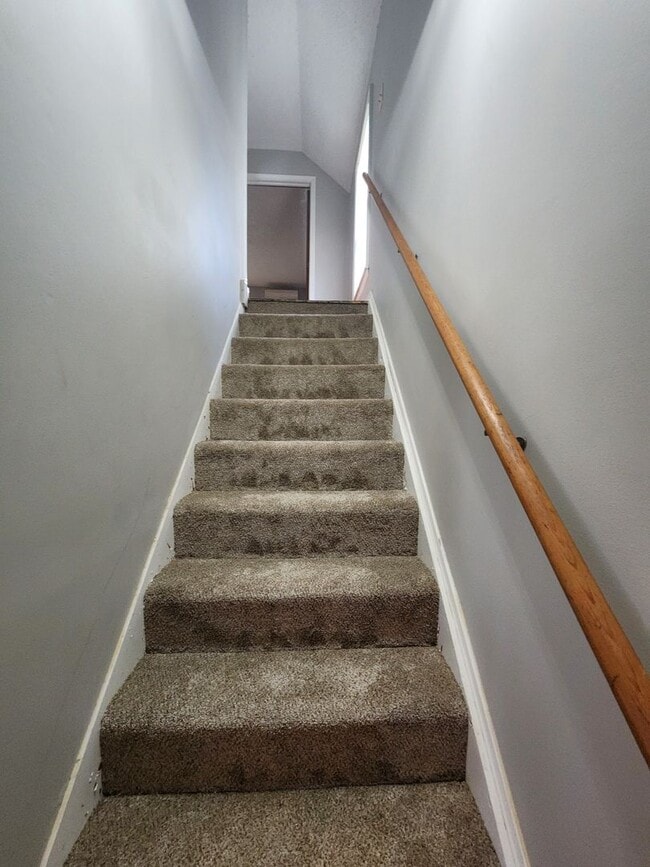 Building Photo - Nice home with oversized 2car gar with work bench and large shaded yard. Country-like setting