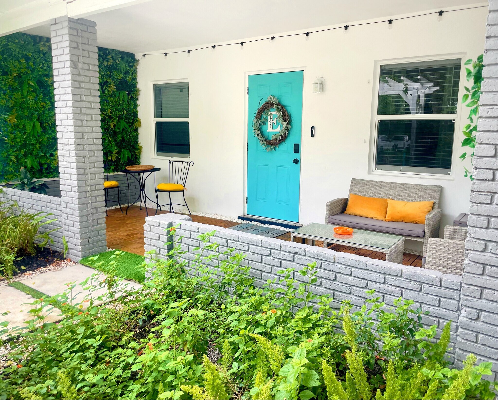 Front butterfly garden. - 941 SW 29th St