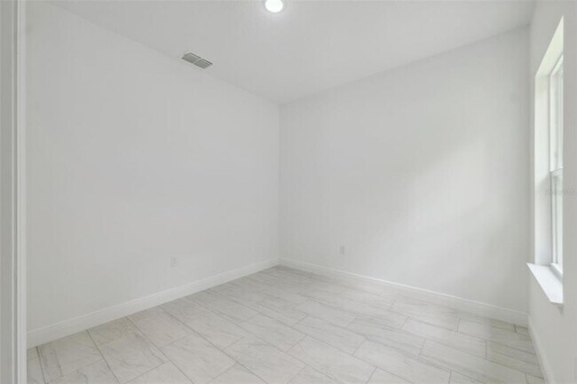 Building Photo - 10089 N Athenia Dr