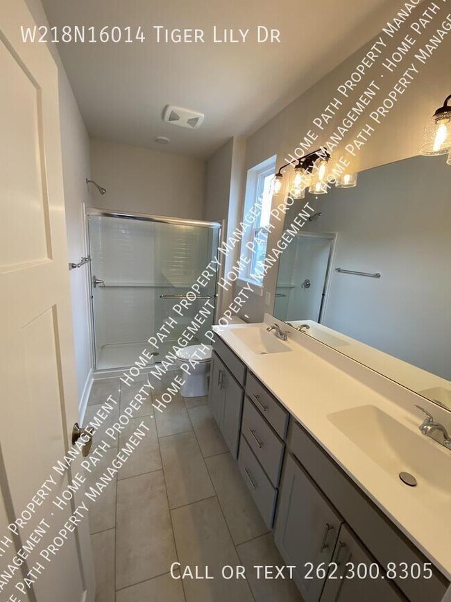 Building Photo - W218N16014 Tiger Lily Dr