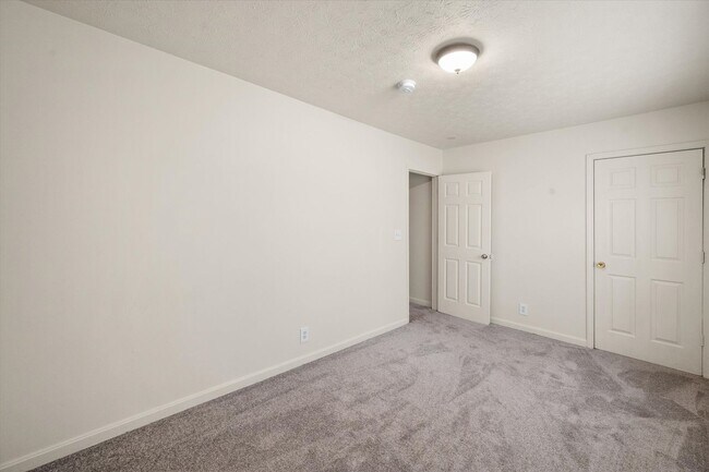 Building Photo - Three Bedroom House With Brand New Carpet