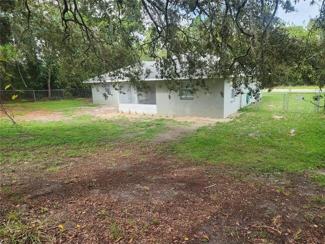 Building Photo - 9392 N Sandree Dr