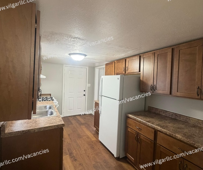 Building Photo - 2-Bedroom • 1-Bathroom Home