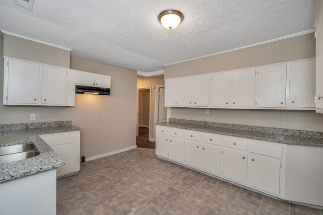 Building Photo - RARE 4BR Bessemer Beauty – Huge Space, Modern Updates & Low Move-In Costs!