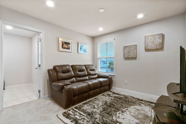 Building Photo - Water Front Home- 4 Large Bedrooms-3 baths Gated Community Call Sheila Campbell 407-687-7900