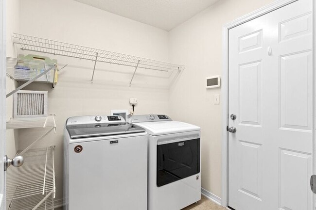 Building Photo - 5659 Tiger Woods Dr