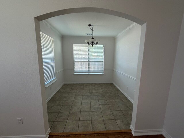 Building Photo - Former model home on corner lot is ready for move in!