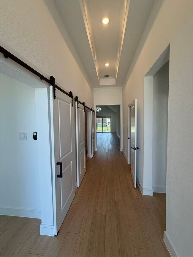 Building Photo - Move-in ready and like-new! Washer, dryer, and refrigerator Included.