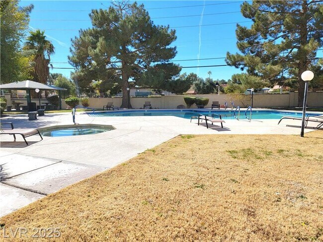 Building Photo - Inviting Green Valley Condo with Dual Balc...