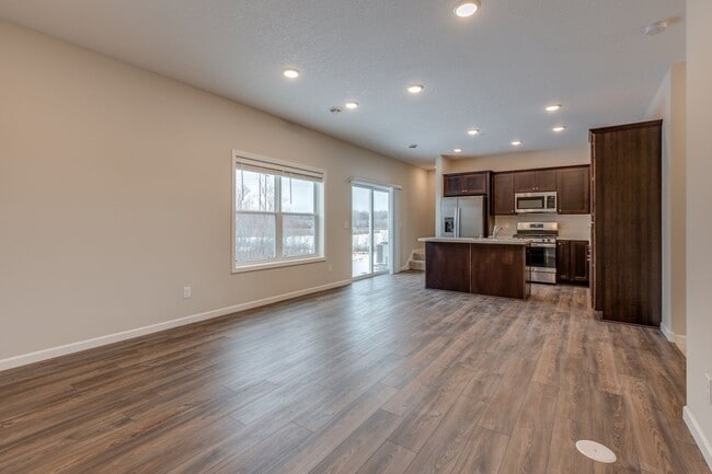 Building Photo - Newer Construction for RENT 3bd 3ba 2 car attached garage END UNIT available Jan 2026