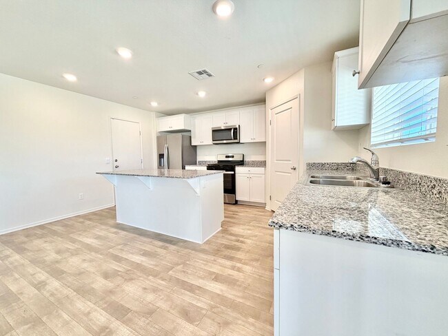 Building Photo - Modern 4 Bedroom 3 Bathroom Living with INCLUDED Solar & Entertainer’s Backyard