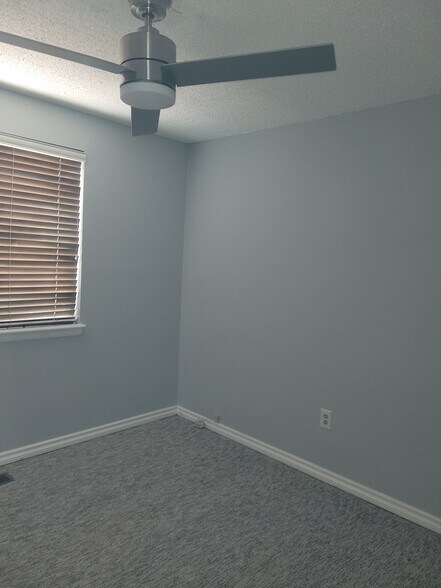 Bedroom 2 - not the Best Picture but has new carpet, remote ceiling fan - 18863 east milan