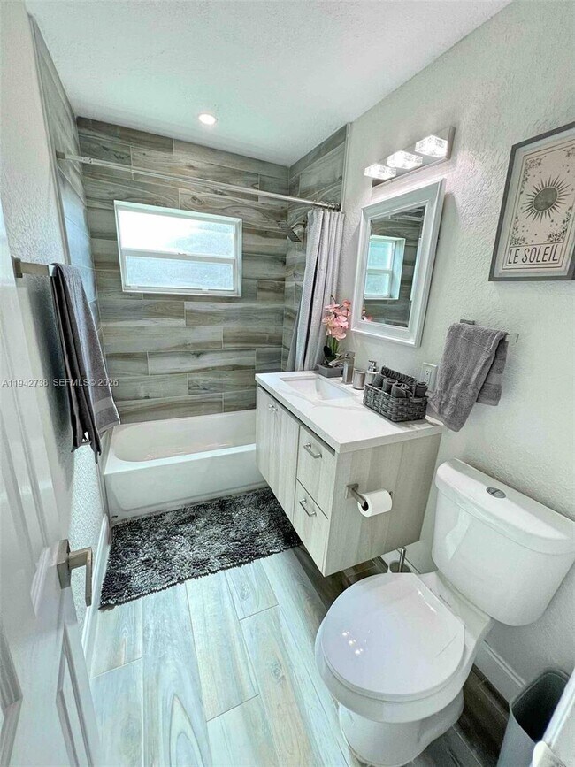 Building Photo - 5249 NE 3rd Ter.