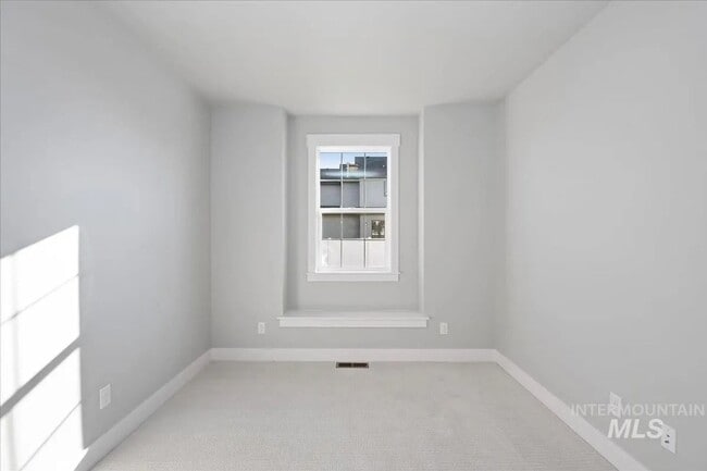 Building Photo - Brand New Spacious 4-Bedroom Home with 3-Car Garage, Granite Kitchen & Prime Middleton Location