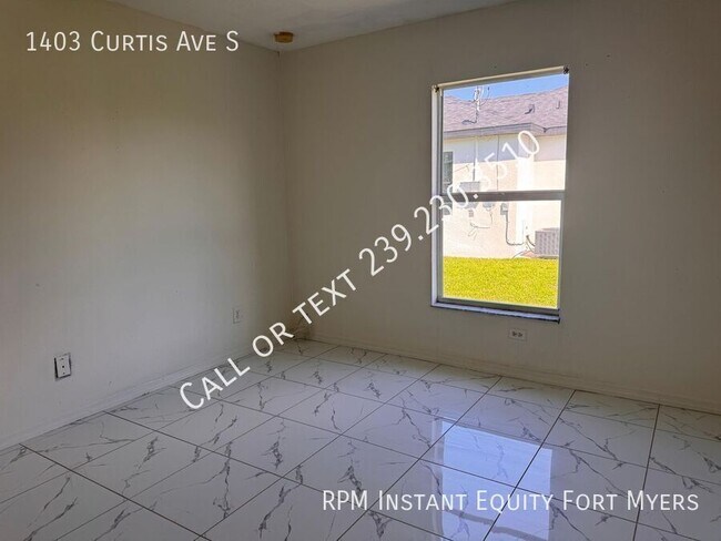 Building Photo - 1403 Curtis Ave S