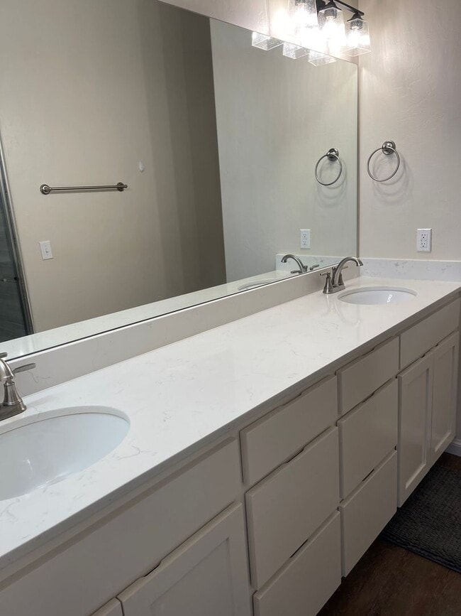 Building Photo - *Fully Furnished* 4 bedroom, 2.5 bathroom, 2 car garage Gated Neighborhood