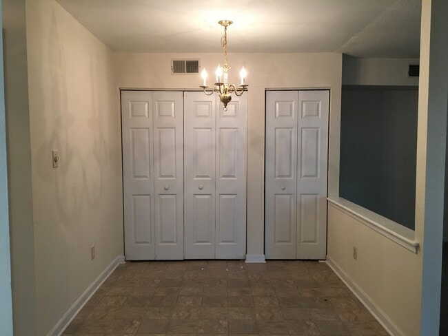 Building Photo - ONE LEVEL CONDO NEAR REX HOSPITAL -Firepla...