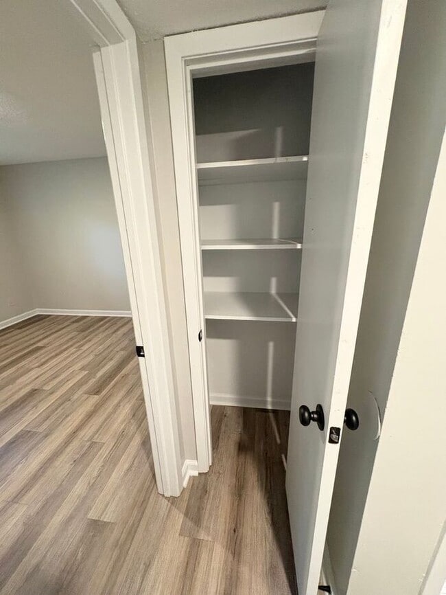 Building Photo - Steps from UofM & Highland Strip – First-Floor 2BR Apartment at The Den!