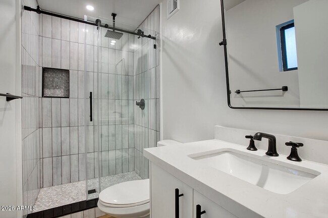 Building Photo - 8015 W Roma Ave