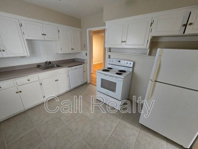 Building Photo - 1218 E 33rd Ave